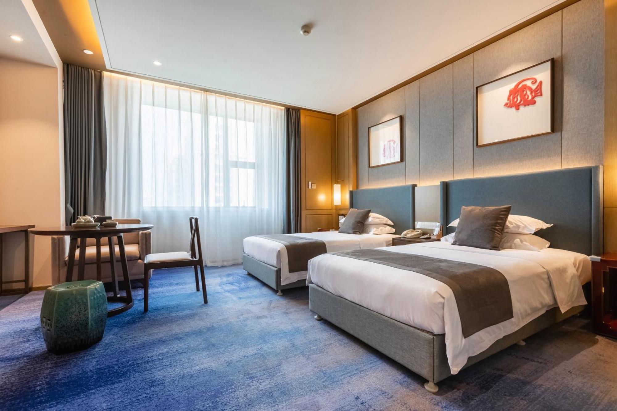 Bliss International Hotel Weihai Exterior photo