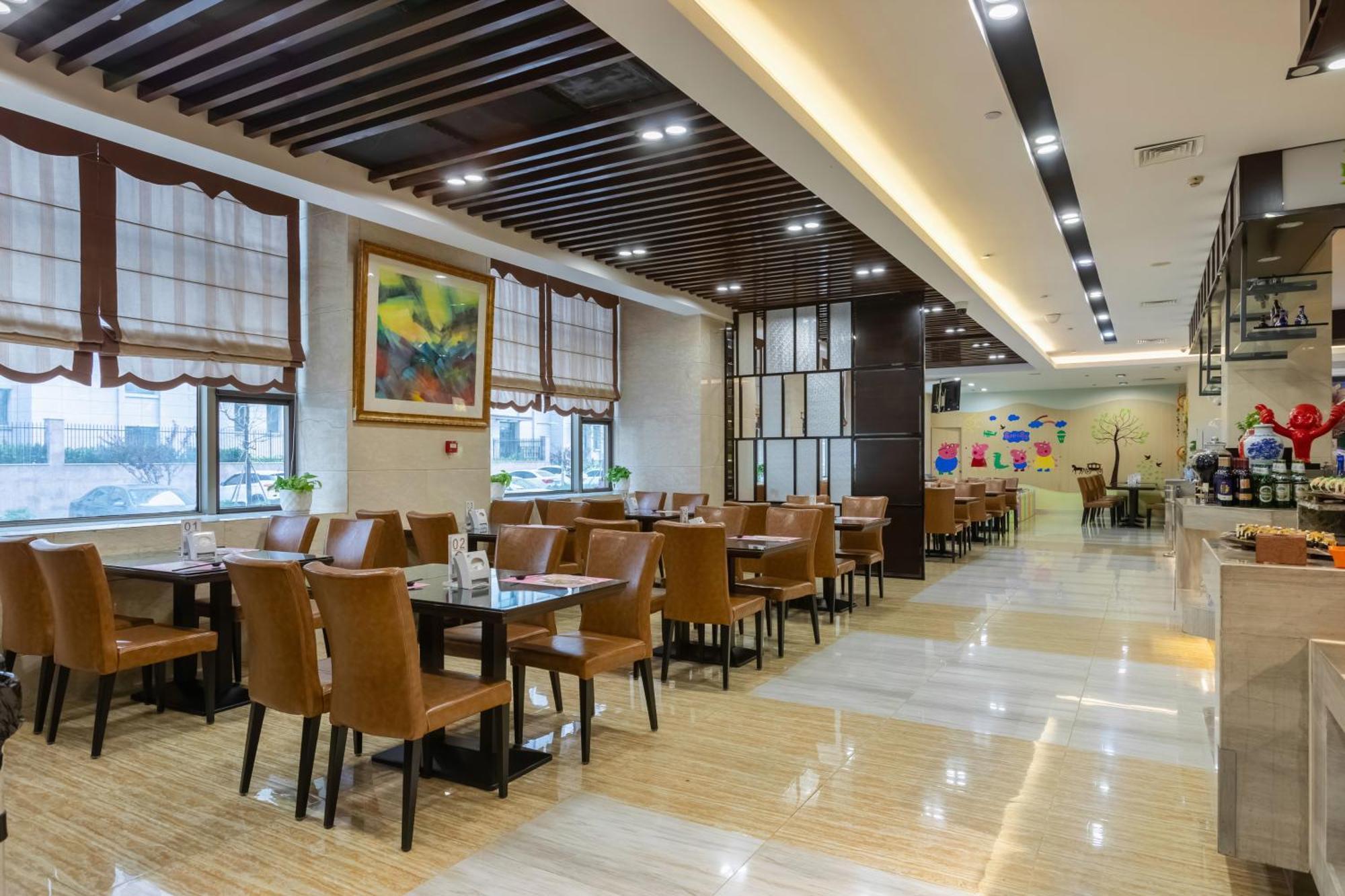 Bliss International Hotel Weihai Exterior photo