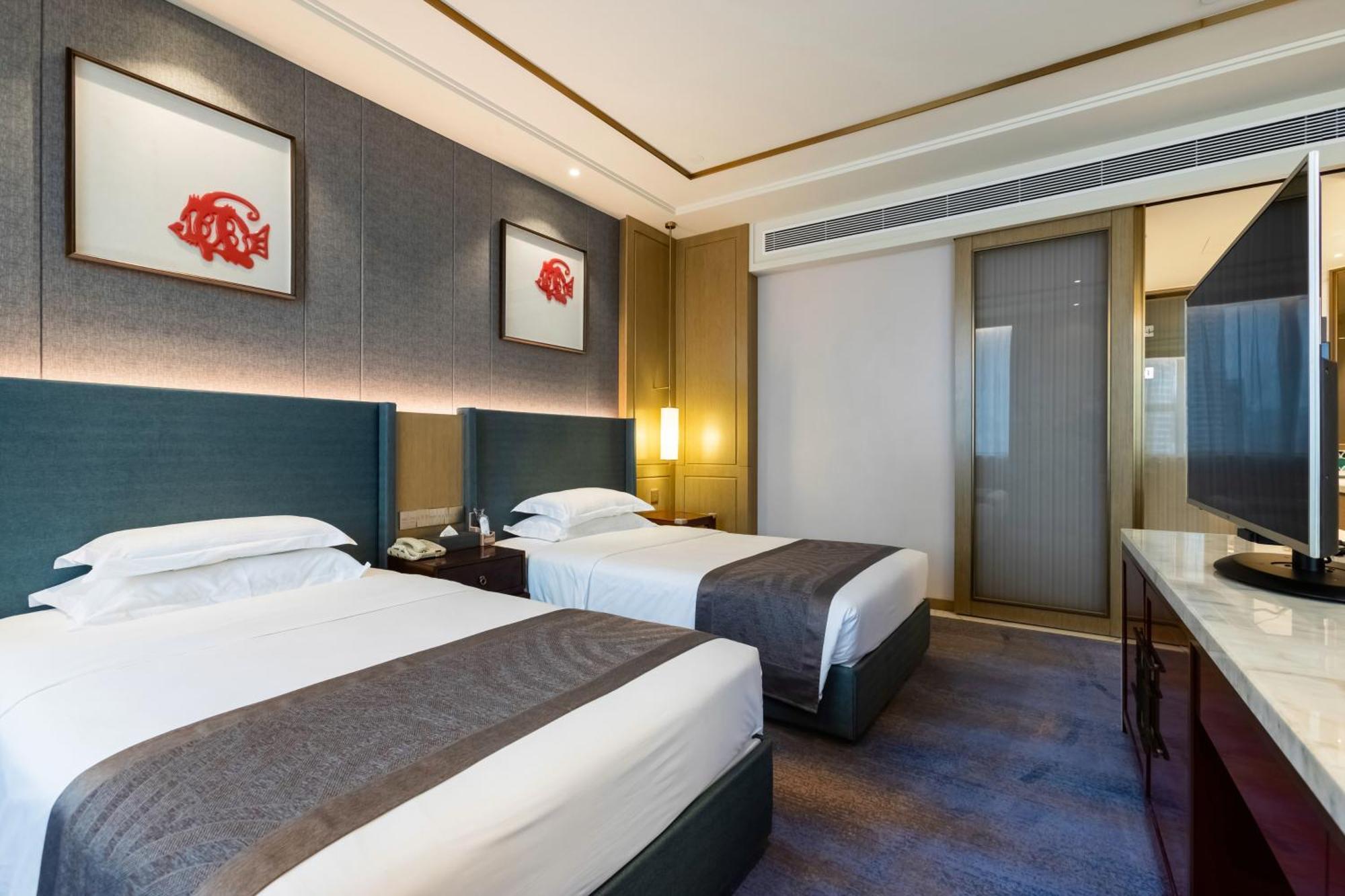 Bliss International Hotel Weihai Exterior photo