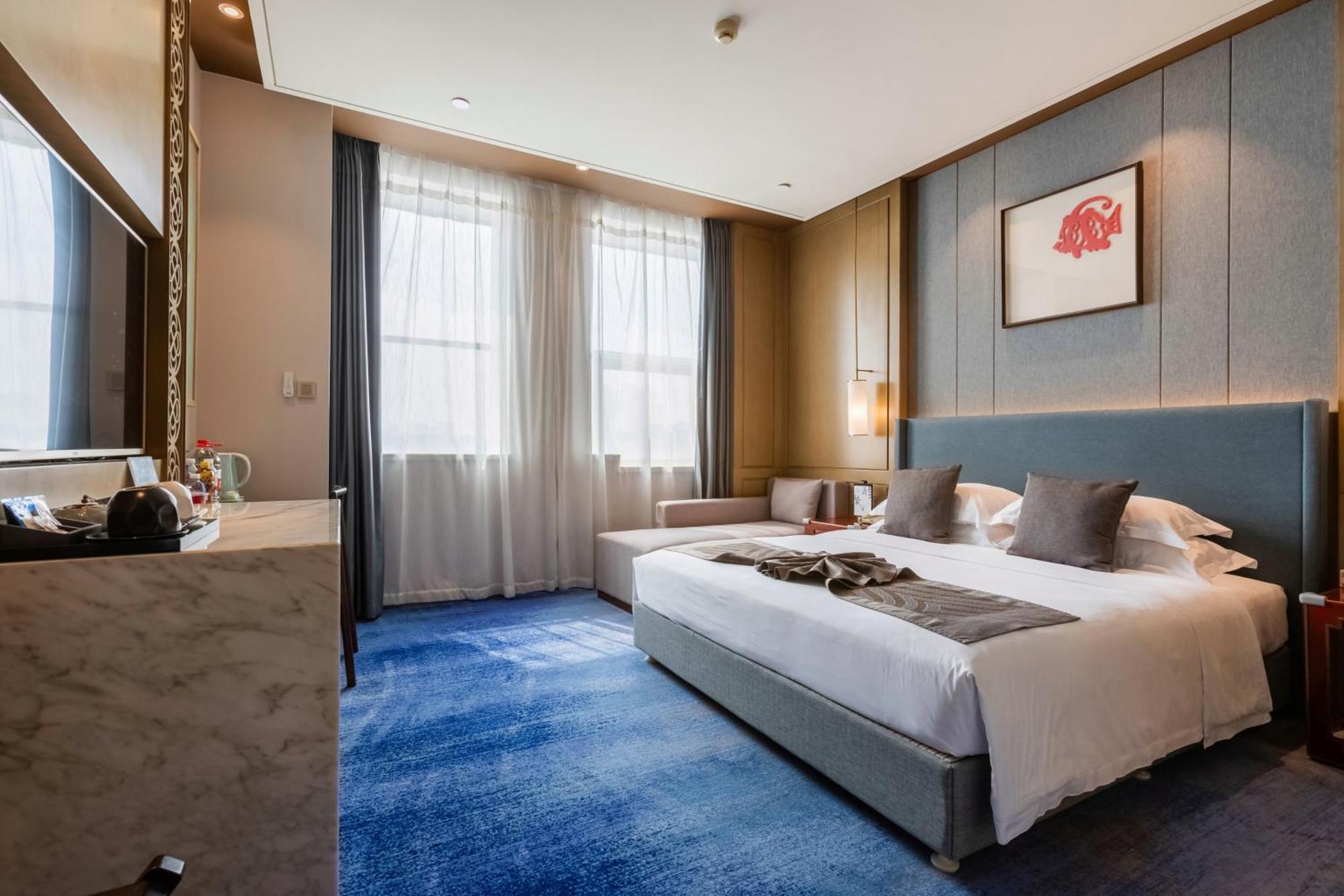 Bliss International Hotel Weihai Exterior photo
